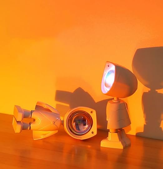 A Mini Robot Sunset Projector Light with a cute robot design, emitting a warm, sunset-like glow.